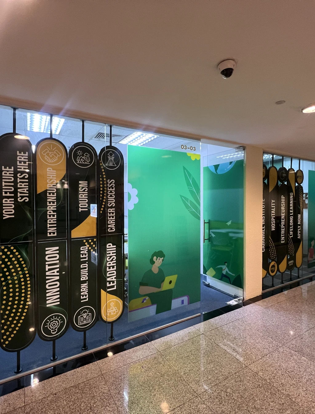 The corridor leading to the Cairnhill teaching room.